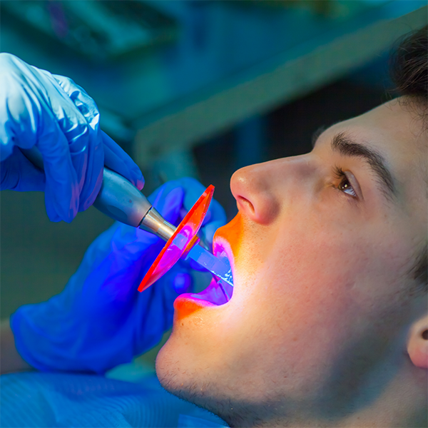 Dental patient getting cosmetic bonding