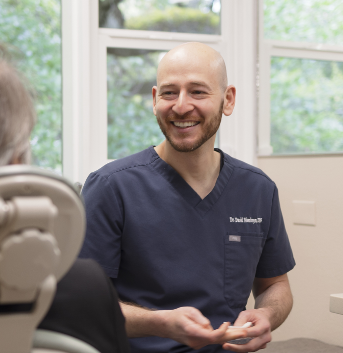Dr. David Nisenboym with a patient