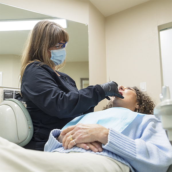 Woman getting a dental exam
