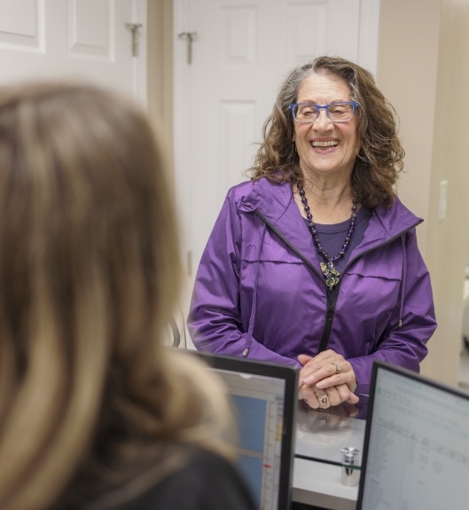 patient smiling at team member