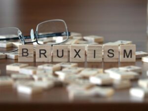 “Bruxism” written on small wooden blocks