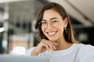 Confident, smiling woman in professional setting 